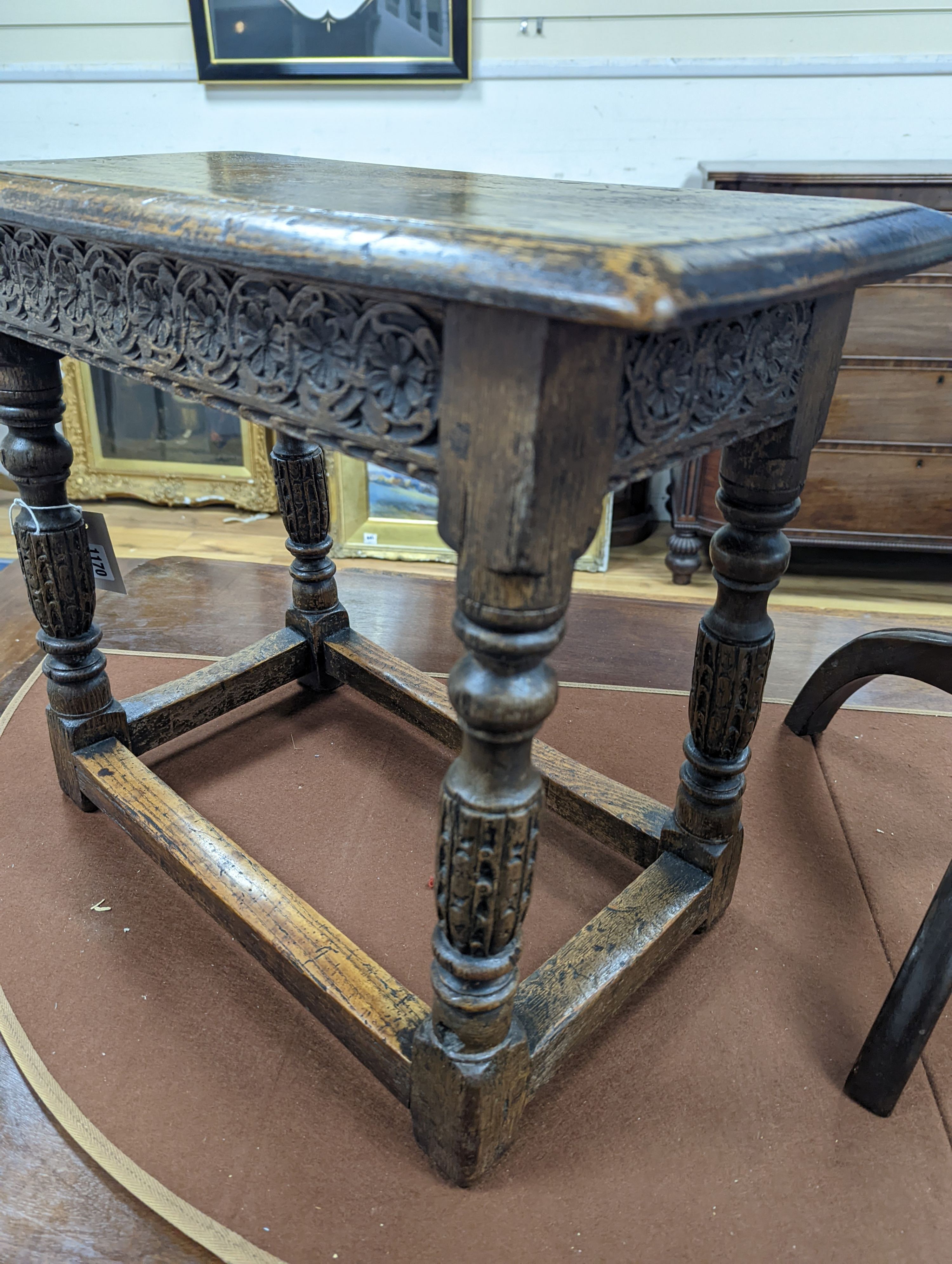 A 17th century style rectangular oak joint stool, width 56cm, depth 28cm, height 47cm